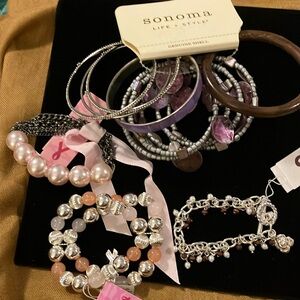 Nine piece lot of ladies assorted new, beautiful bracelets